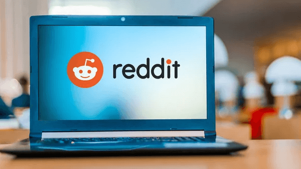 văn bản thay thế: Hình ảnh hiển thị logo Reddit trên Máy tính xách tay